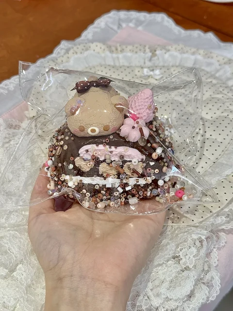 Chocolate-inspired bear daifuku squishy with tiny decorative details
