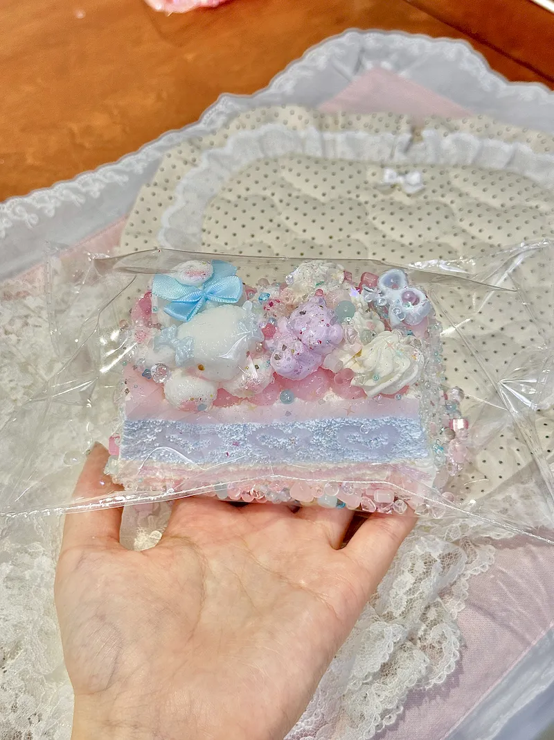 Close-up store photo of the bunny cake’s miniature pastel details